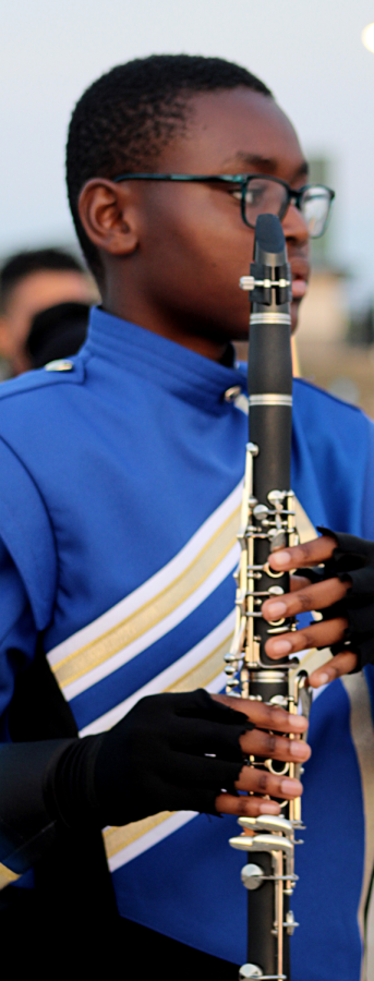 Clarinet player Zane Anyagafu, 9, marches with the Band of Gold at the Bands of America competition in Denton on Oct. 15.