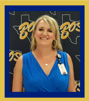 Principal Nika Davis stands in front of a Boswell backdrop during open house in September.