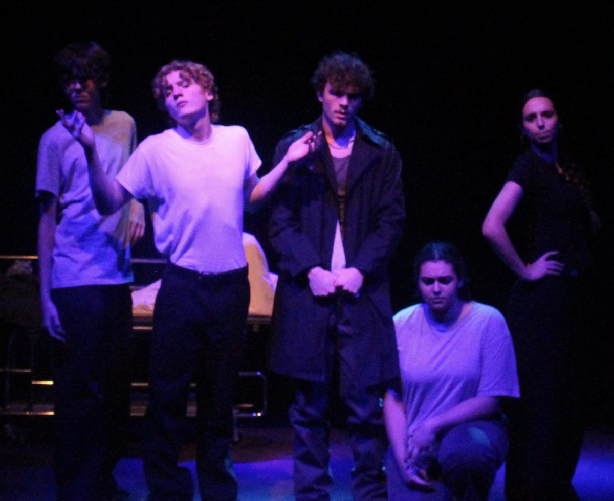 Seniors Casey Colburn and Cavan Ray, freshman Jaise Hamilton, senior Jules Eberle and sophomore Leilani Santiago pose during a performance of "I Heard You Were Dead."